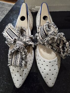 Rothy's Beige Pointed-Toe Woven Flats with Black Fringe Bow